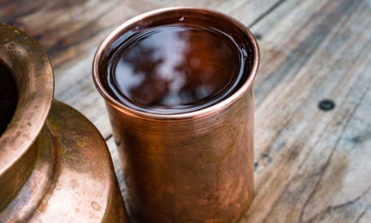 Drinking Water from Copper Bottles